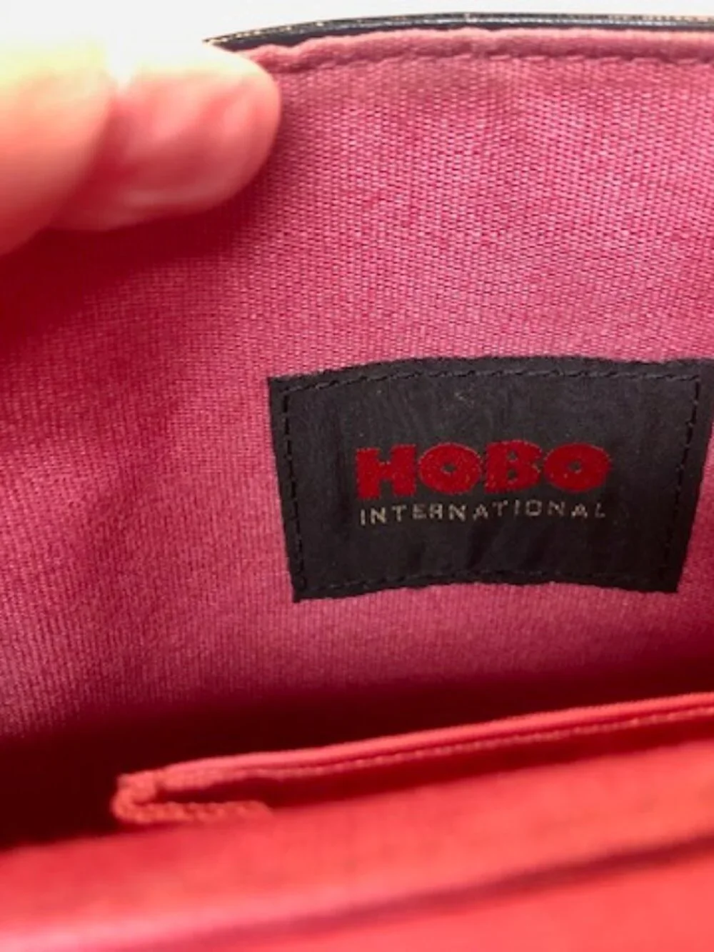 Hobo International black leather crossbody purse wallet dark pink lining